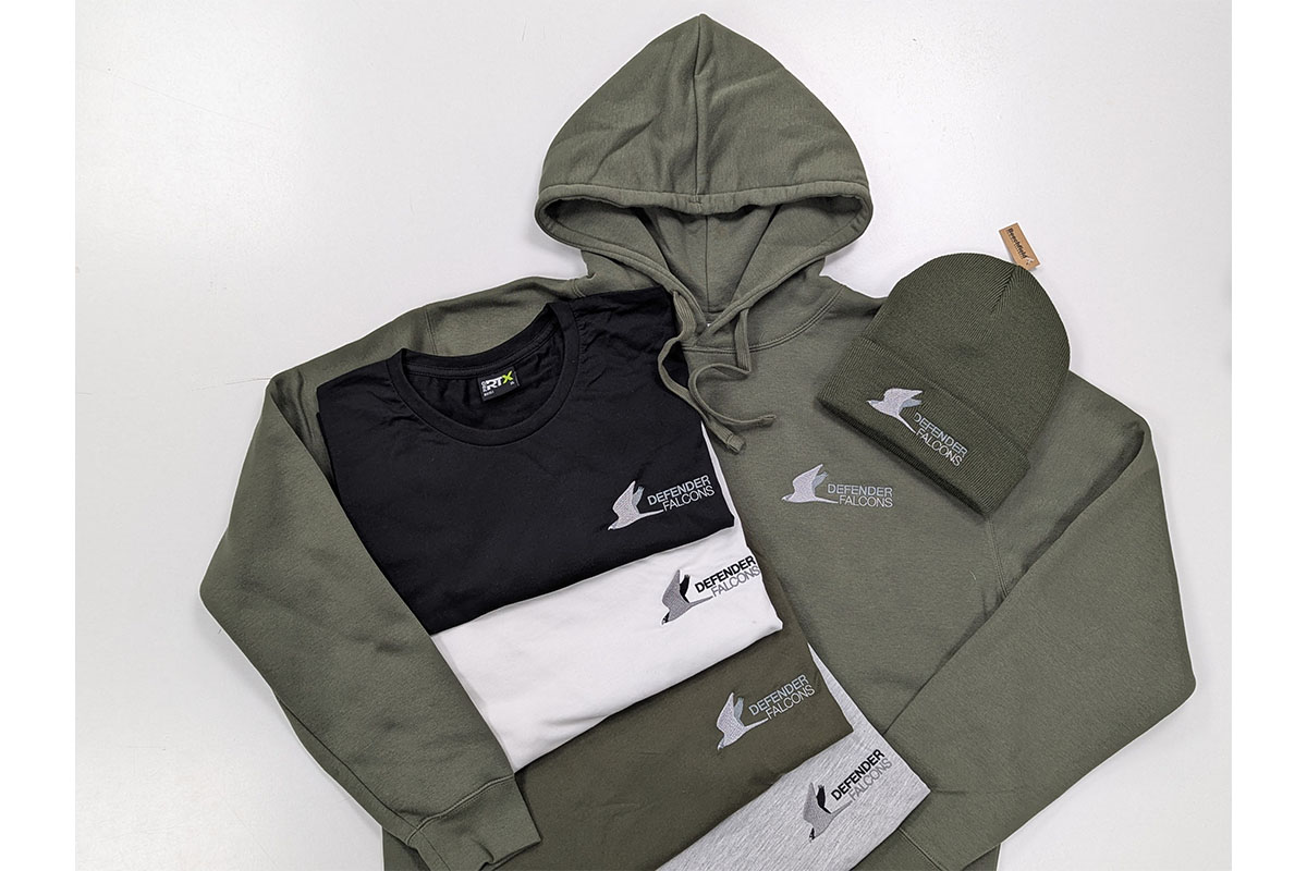 Top Marques - Avian Bird Control The complete workwear uniform for Avian Bird Control, featuring a durable khaki hoodie, embroidered t-shirts, and a matching beanie.