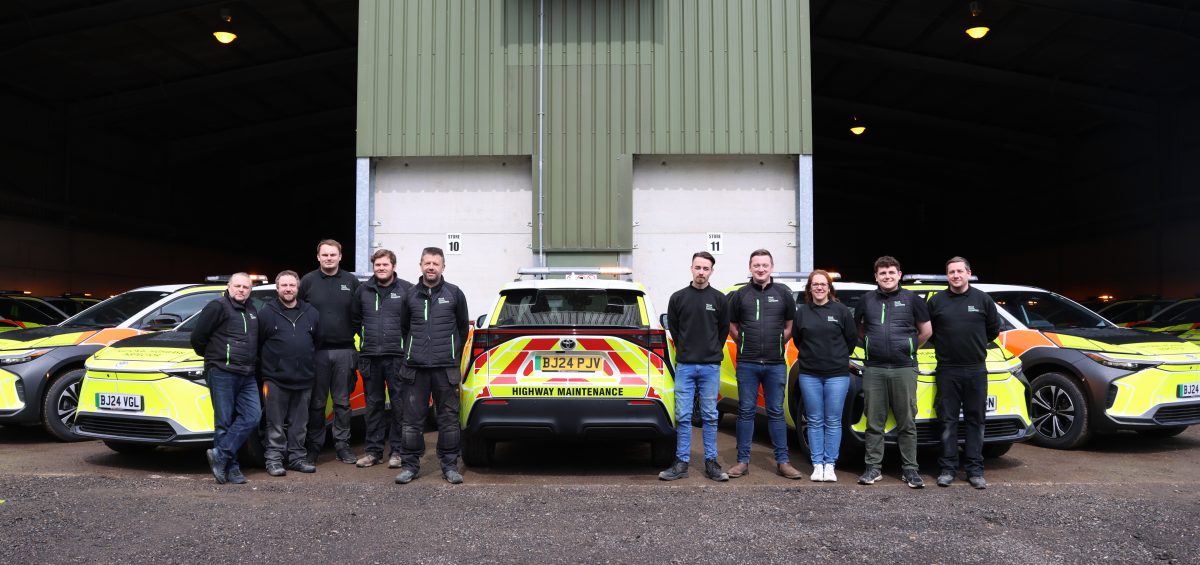 Richell Team in their customised uniforms, alongside Highway Maintenance rapid response vehicles.